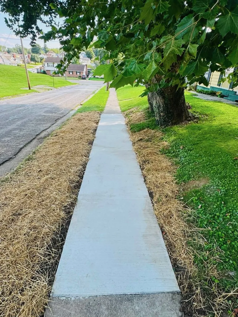 New sidewalk, seeded and finished by TH Concrete in Portsmouth, Ohio