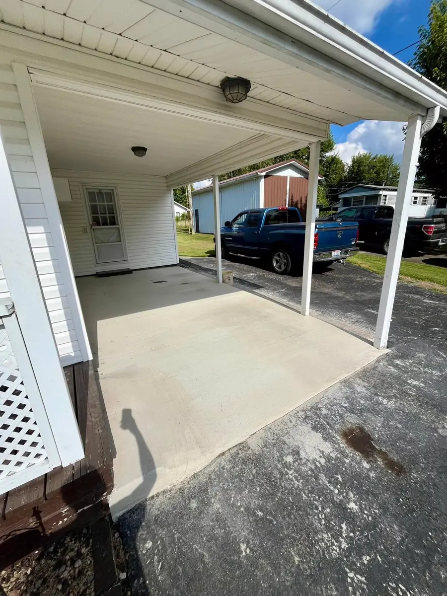 Smooth carport slab under a covered bay
