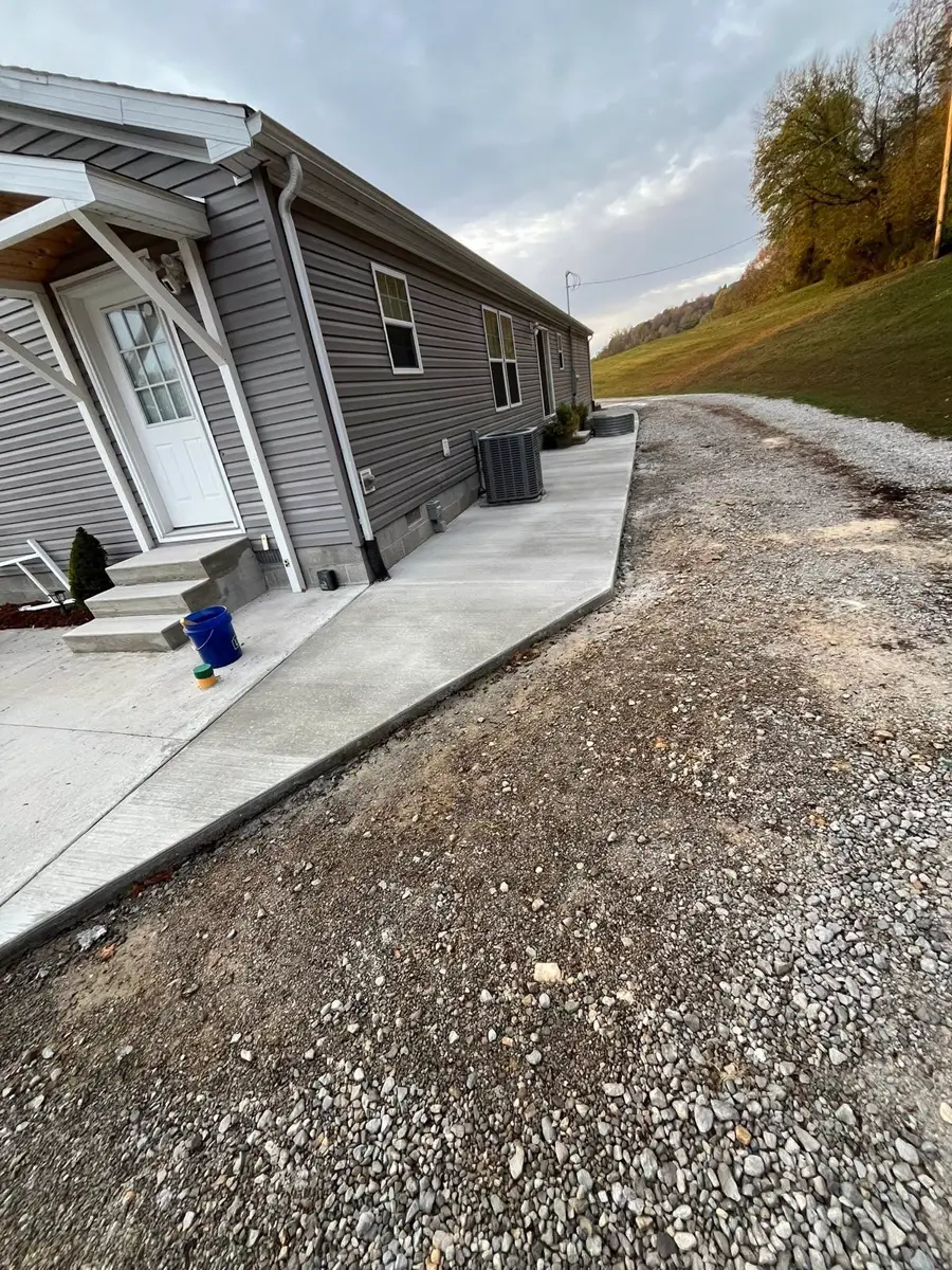 Curved front walk leading to a porch